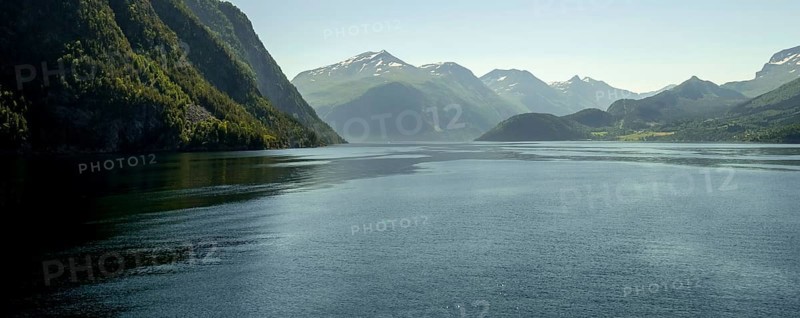 Panoramic view, fjord and mountain formations, Storfjord, Stranda, Møre og Romsdal, Norway, Scandinavia, Europe, adventure travel, mountains, fjord, tourism, Hurtigruten, Hurtigruten voyage, cruise, Møre og Romsdal, NOR, panoramic view, panoramic photo, travel, destination, ship's bow, sea voyage, sightseeing, tourism, blue sea, Norwegian, Scandinavian, touristic