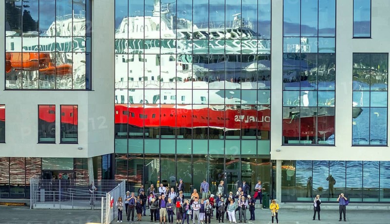 Cruise ship MS Polarlys, reflection, tourists at the quay, Ã...lesund, Møre og Romsdal, Norway, Scandinavia, Europe, adventure trip, excursion, excursion ship, tourism, harbour, Hurtigruten, Hurtigruten trip, cruise, cruise ship, Møre og Romsdal, NOR, journey, destination, ship, shipping, sea voyage, sightseeing, tourism, Norwegian, Scandinavian, touristic, Ålesund