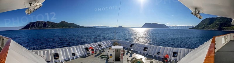 Ship bow, backlight, panorama, Godøya, Møre og Romsdal, Norway, Scandinavia, Europe, adventure travel, tourism, Godøya, Hurtigruten, Hurtigrutenreise, cruise, Møre og Romsdal, NOR, travel, destination, sea voyage, sightseeing, sun, star shape, tourism, blue sea, Norwegian, Scandinavian, touristic, nordlandreise, Nordmeer, ship passage
