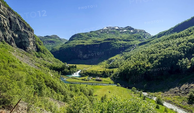 Journey on the Flam Railway, iron railway journey, view from the Flåmsbana, Ryavegen, mountains, forests, meadows, blue sky, Flåm, Sogn og Fjordane, Norway, Scandinavia, Europe, Flåm, NOR, travel, tourism, destination, sightseeing, sea voyage, Hurtigruten, Hurtigruten voyage, tourism, Norwegian, Scandinavian, tourist, cruise, adventure trip