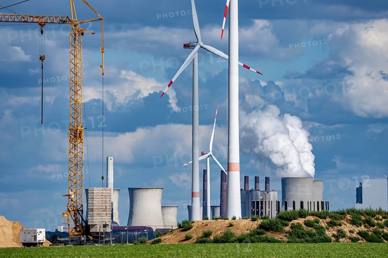 Construction site for the expansion of the wind farm east of Jackerath, in the Rhenish lignite mining area, in the background, the RWE lignite-fired power plant Neurath, North Rhine-Westphalia, Germany