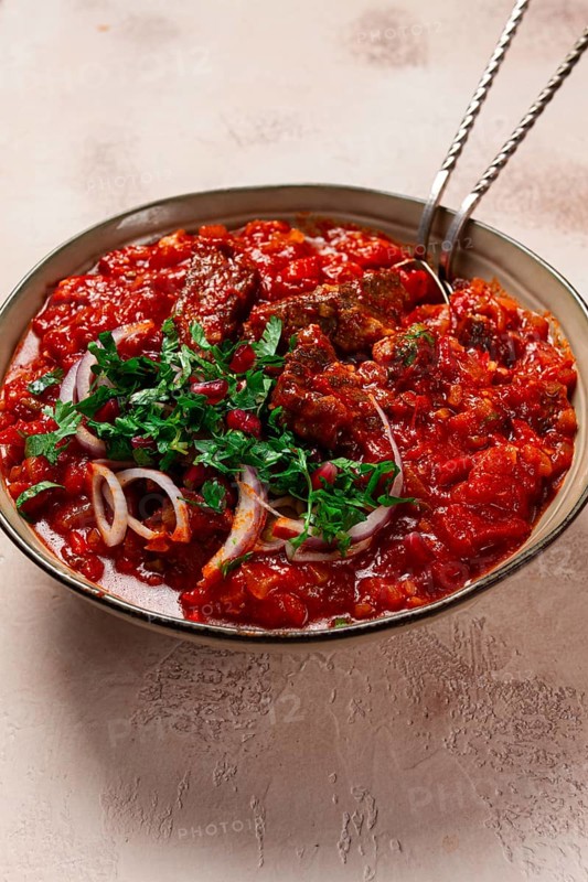 Chashushuli, a traditional Georgian dish, spicy, stewed meat with tomatoes and spices, homemade, no people