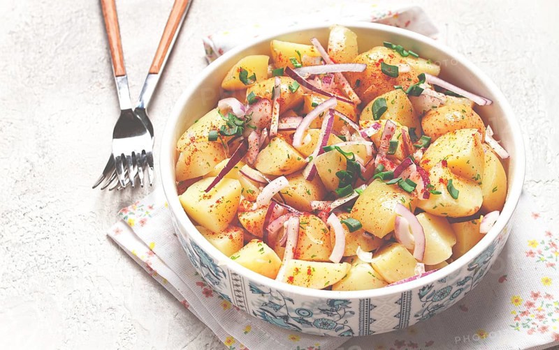Boiled potato salad with red onion, German cuisine, homemade, no people
