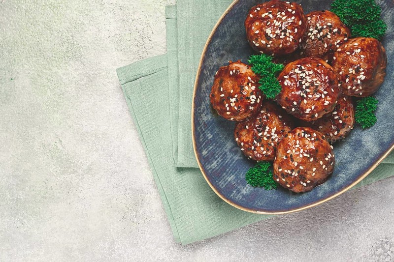 Tsukune, Japanese meatballs, minced chicken, fried on a skewer, with yakitori sauce, homemade, no people