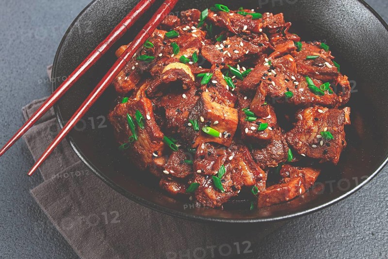 Bulgogi, with mushrooms, with sesame seeds and green onions, Korean cuisine, homemade, no people