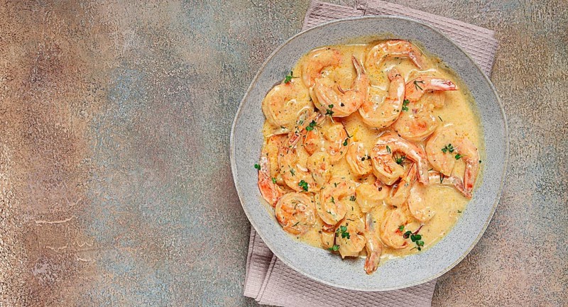 Shrimp in creamy garlic sauce, with spices and herbs
