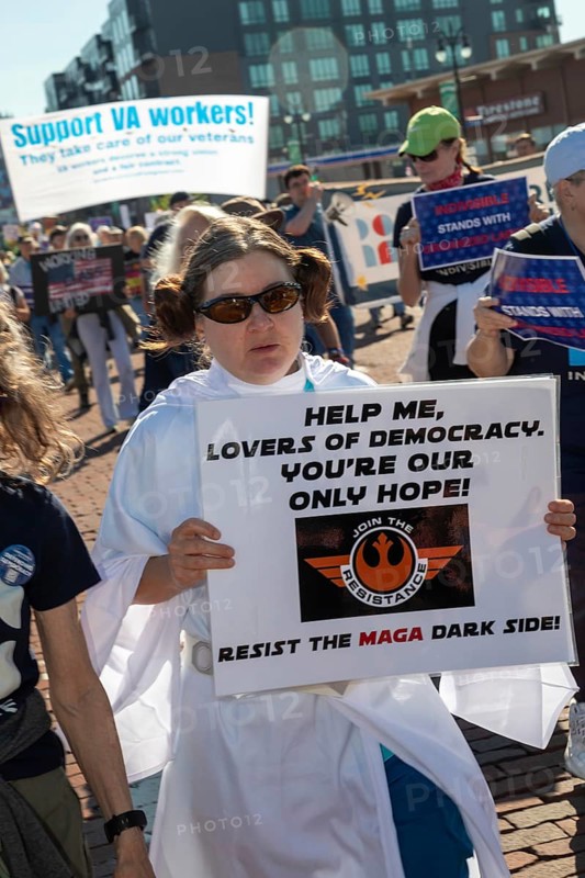 Detroit, Michigan USA - 1 September 2025 - A union member dressed as Princess Leia from Star Wars marches in Detroit's Labor Day parade, warning of 'the MAGA dark side.'