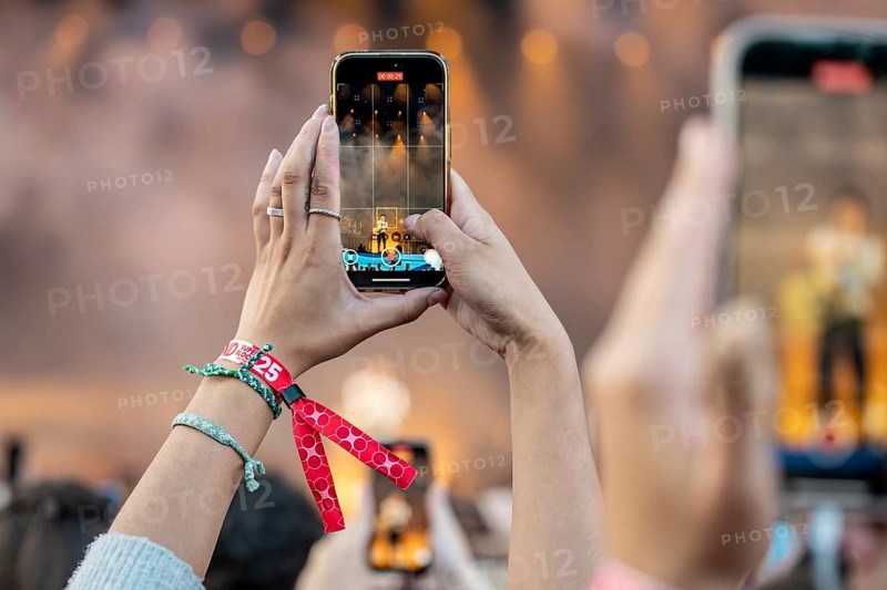 Visitors film the performance of Shawn Mendes at the Superbloom Festival, Day 2 at the Olympiapark, Munich, 31/08/2025