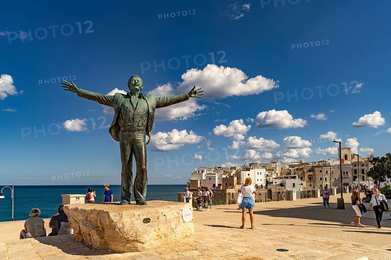 Statue of the singer Domenico Modugno, Polignano a Mare, Apulia, Italy