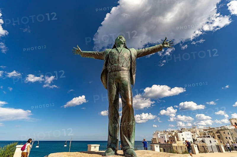 Statue of the singer Domenico Modugno, Polignano a Mare, Apulia, Italy