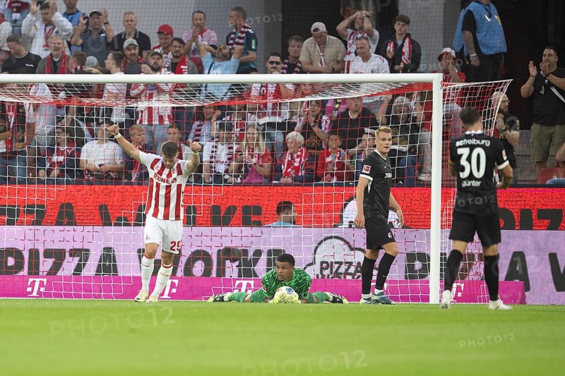 (DFL/DFB REGULATES PROHIBIT ANY USE OF PHOTOGRAPHS AS IMAGE SEQUENCES AND/OR QUASI-VIDEO), RheinEnergieStadion, Cologne, North Rhine-Westphalia, Jusuf Gazibegovic (1.FC Köln, Defence, #25), Alexander Schwolow (SC Freiburg, Goalkeeper, #1), 1st Bundesliga, 1.FC Köln, SC Freiburg on 31.08.2025 at the RheinEnergieStadion in Cologne Germany