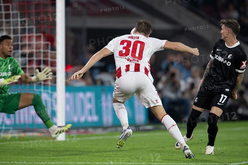 (DFL/DFB REGULATES PROHIBIT ANY USE OF PHOTOGRAPHS AS IMAGE SEQUENCES AND/OR QUASI-VIDEO), RheinEnergieStadion, Cologne, North Rhine-Westphalia, Alexander Schwolow (SC Freiburg, Goalkeeper, #1), Marius Bülter (1.FC Köln, Forward, #30), 1st Bundesliga, 1.FC Köln, SC Freiburg on 31.08.2025 at the RheinEnergieStadion in Cologne Germany