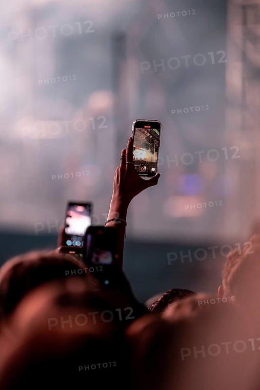 Visitors film Post Malone's performance at the Superbloom Festival, Day 1 at the Olympiapark, Munich, 30/08/2025