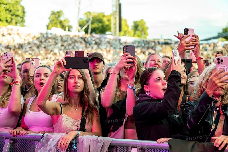 Visitors film the performance of Nelly Furtado with their mobile phones at the Superbloom Festival, Day 1 at the Olympiapark, Munich, 30.08.2025