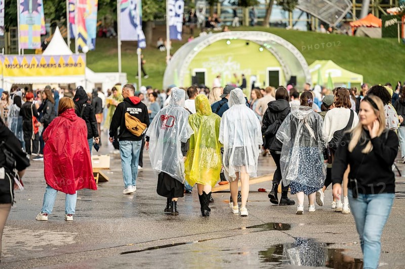 Festival visitors with rain capes at the Superbloom Festival, Day 1 in the Olympic Park, Munich, 30/08/2025