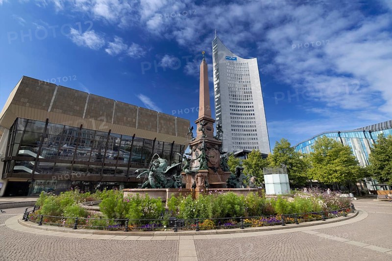 City skyscraper at Augustusplatz with Mende fountain, Leipzig, Saxony, Germany, 26.08.2025 < english> City skyscraper at Augustusplatz with Mende fountain, Saxony, August 26, 2025