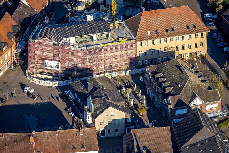 Aerial view, town hall and new building construction site with facade cladding, market place, Olfen town, Olfen, Münsterland, North Rhine-Westphalia, Germany, construction work, construction area, building site, building plots, construction project, construction site, authority, DE, Europe, aerial view, aerial photography, aerial photography, overview, bird's-eye view, overview