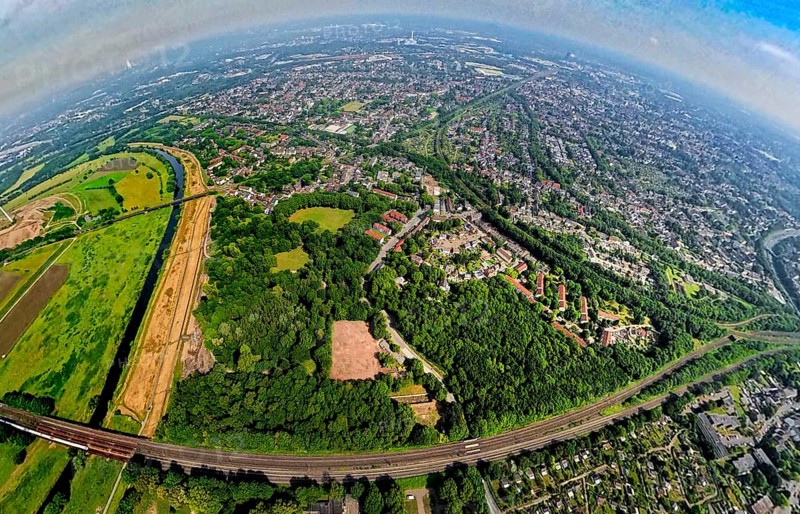 Aerial view, Ruhrpark forest area on the Ruhr river and Ruhr valley with railway bridge, construction site on the banks of the Ruhr and ferry road, globe, fisheye image, fisheye image, 360 degree image, tiny world, little planet, fisheye image, Alstaden, Oberhausen, Ruhr area, North Rhine-Westphalia, Germany, DE, Europe, fisheye lens, fisheye lens, aerial view, aerial photography, aerial photography, super wide angle lens, overview, bird's eye view, birds-eyes view, fisheye lens, insta360 camera, overview