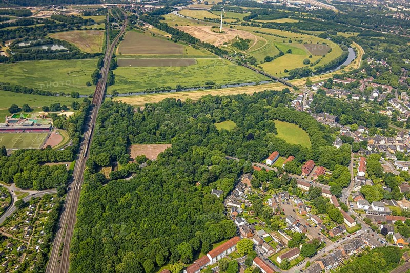 Aerial view, Ruhrpark forest area, railway bridge and river Ruhr with Ruhr bank, sports field in the forest, behind the energy park Styrumer Ruhrbogen, Oberhausen, Ruhr area, North Rhine-Westphalia, Germany, DE, Europe, aerial view, aerial photography, aerial photography, overview, birds-eyes view, overview, OberhausenSued