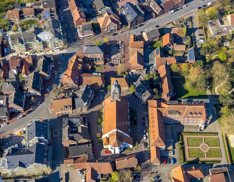 Aerial view, church St. Mauritius, children's sanatorium social institution at Mauritiusplatz, top left town hall municipal administration construction site with conversion and renovation, corner Bohlenstraße and Bergstraße, Nordkirchen, Münsterland, North Rhine-Westphalia, Germany, place of worship, construction work, construction area, building site, building plots, construction measure, construction project, construction site, authority, community centre, DE, Europe, religious community, place of worship, holy place, hospital, church, parish, denomination, infirmary, hospital, aerial view, aerial photography, aerial photography, medical facility, medical aid, town hall, religion, religious site, city administration, overview, bird's-eye view, birds-eyes view, overview, medical care