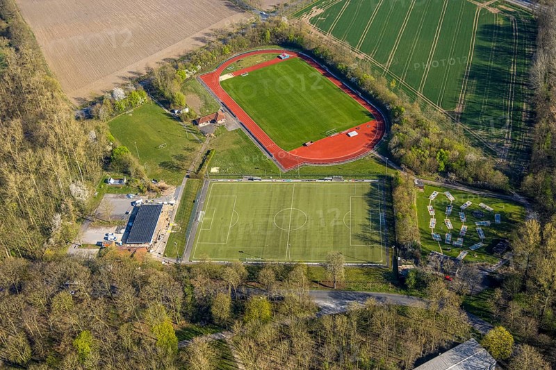 Aerial view, sports field football stadium and athletics stadium FC Nordkirchen 1926 e.V., building construction site, miniature golf course, Nordkirchen, Münsterland, North Rhine-Westphalia, Germany, construction work, construction area, building site, building plots, construction project, construction site, DE, Europe, football field, football stadium, aerial view, aerial photography, aerial photography, sports, sports facilities, sports field, sports facility, stadium, overview, bird's eye view, birds-eyes view, overview