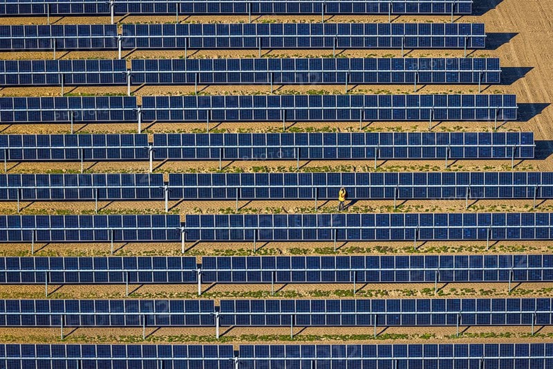 Aerial photo, solar park, open-space photovoltaic plant in the Berger farming community, shapes and colours, work on the solar panel, Nordkirchen, Münsterland, North Rhine-Westphalia, Germany, DE, Europe, photovoltaics, aerial photo, aerial photography, aerial photography, photovoltaic plant, solar, solar plant, solar energy, solar panel, solar power plant, overview, bird's-eye view, birds-eyes view, overview