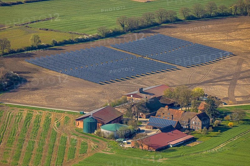 Aerial photo, solar park, open space photovoltaic plant in the Berger farming community, Baustoffkontor Nord GmbH solar technology provider, Nordkirchen, Münsterland, North Rhine-Westphalia, Germany, DE, Europe, photovoltaics, aerial photo, aerial photography, aerial photography, photovoltaic plant, solar, solar plant, solar energy, solar panel, solar power plant, overview, bird's eye view, birds-eyes view, overview
