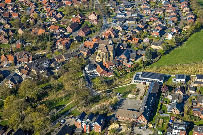 Aerial view, catholic church St. Dionysius, catholic primary school Capelle and village community centre, residential area district Capelle, Nordkirchen, Münsterland, North Rhine-Westphalia, Germany, place of worship, education, educational institution, DE, Europe, religious community, place of worship, holy place, church, parish, denomination, educational institute, aerial view, aerial photography, aerial photography, religion, religious site, school, overview, bird's eye view, birds-eyes view, overview