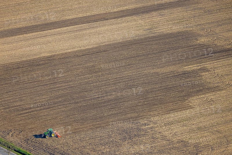 Aerial view, agricultural work with tractor on a field, Ascheberger Straße, Capelle, Nordkirchen, Münsterland, North Rhine-Westphalia, Germany, agricultural landscape, DE, Europe, agricultural machinery, agriculture, agricultural fields, aerial photograph, aerial photography, aerial photography, overview, bird's-eye view, bird's-eye view, overview