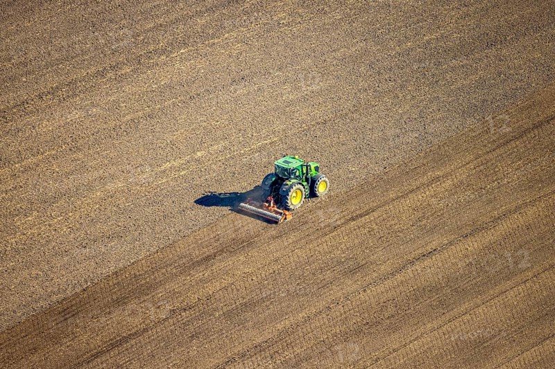 Aerial view, agricultural work with tractor on a field on Ascheberger Straße, Capelle, Nordkirchen, Münsterland, North Rhine-Westphalia, Germany, agricultural landscape, DE, Europe, agricultural machinery, agriculture, agricultural fields, aerial view, aerial photography, aerial photography, overview, bird's-eye view, bird's-eye view, overview