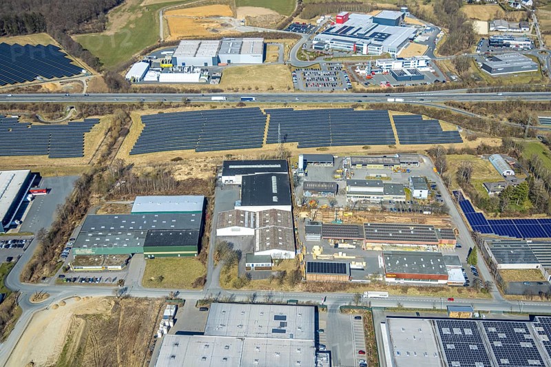 Aerial view, commercial area Enste with citizen solar park at the motorway A46, Enste, Meschede, Sauerland, North Rhine-Westphalia, Germany, DE, Europe, photovoltaic, commercial enterprises, commercial area, commercial property, commercial site, commercial use, industrial area, industrial site, aerial view, aerial photography, aerial photography, photovoltaic plant, solar, solar plant, solar roof, solar energy, solar panel, solar park, solar power plant, overview, bird's-eye view, birds-eyes view, overview