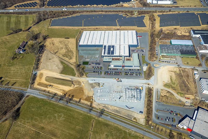 Aerial view, commercial area Enste with citizen solar park at the motorway A46, Enste, Meschede, Sauerland, North Rhine-Westphalia, Germany, DE, Europe, photovoltaic, commercial enterprises, commercial area, commercial property, commercial site, commercial use, industrial area, industrial site, aerial view, aerial photography, aerial photography, photovoltaic plant, solar, solar plant, solar roof, solar energy, solar panel, solar park, solar power plant, overview, bird's-eye view, birds-eyes view, overview