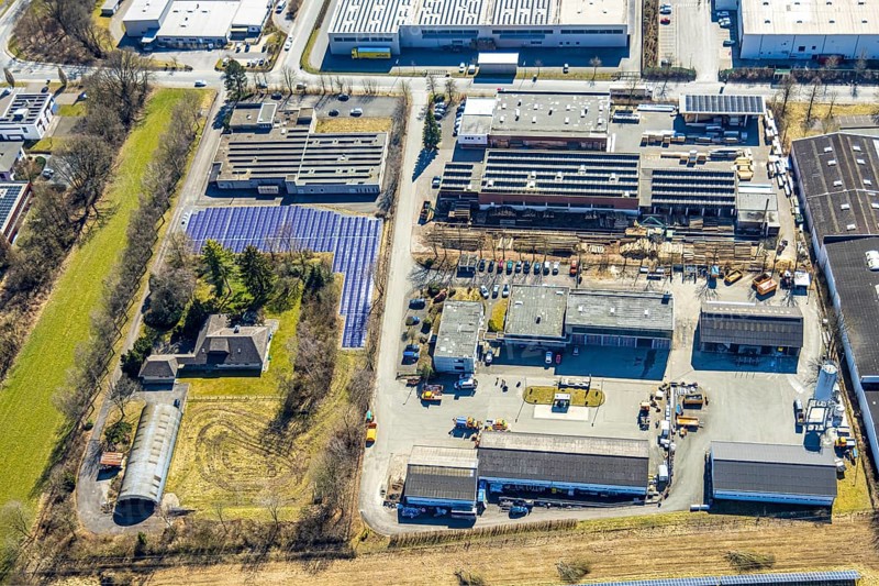Aerial view, commercial area Enste with citizen solar park at the motorway A46, Enste, Meschede, Sauerland, North Rhine-Westphalia, Germany, DE, Europe, photovoltaic, commercial enterprises, commercial area, commercial property, commercial site, commercial use, industrial area, industrial site, aerial view, aerial photography, aerial photography, photovoltaic plant, solar, solar plant, solar roof, solar energy, solar panel, solar park, solar power plant, overview, bird's-eye view, birds-eyes view, overview
