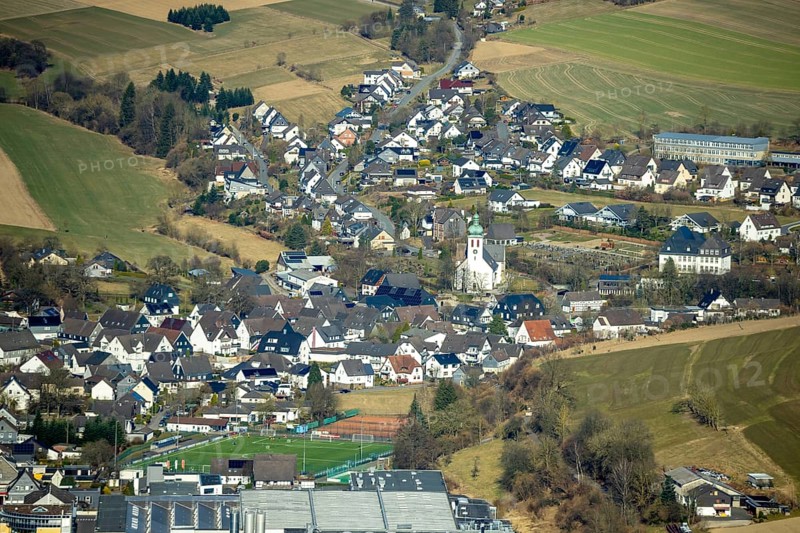 Aerial view, residential area and village view with catholic church St. Jakobus der Ältere in Elspe, Lennestadt, Sauerland, North Rhine-Westphalia, Germany, place of worship, DE, Europe, religious community, place of worship, property tax, holy site, real estate, church, parish, denomination, aerial view, aerial photography, aerial photography, religion, religious site, overview, bird's-eye view, residential area, living and life, residential area, residential quality, residential neighbourhood, housing estate, residential area, birds-eyes view, overview
