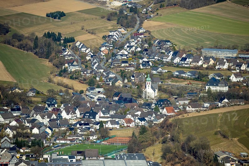 Aerial view, residential area and village view with catholic church St. Jakobus der Ältere in Elspe, Lennestadt, Sauerland, North Rhine-Westphalia, Germany, place of worship, DE, Europe, religious community, place of worship, property tax, holy site, real estate, church, parish, denomination, aerial view, aerial photography, aerial photography, religion, religious site, overview, bird's-eye view, residential area, living and life, residential area, residential quality, residential neighbourhood, housing estate, residential area, birds-eyes view, overview