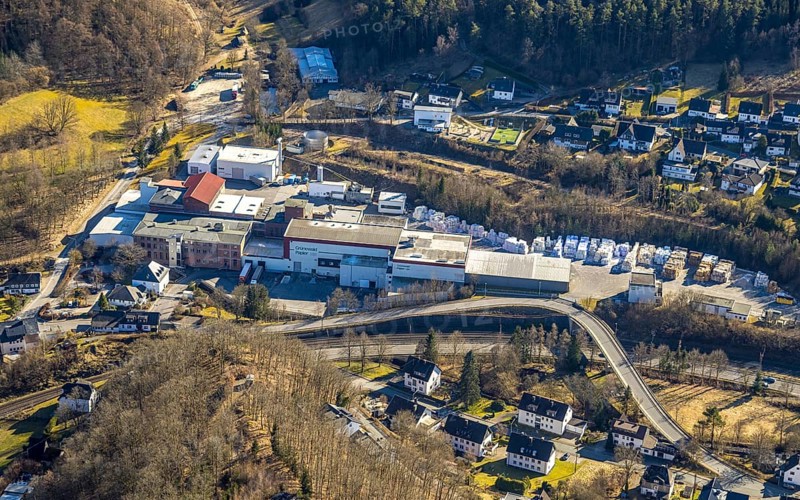 Aerial view, Grünewald Papier factory premises, view of the village and curved Antoniusstraße with bridge over the federal road B517 in Hofolpe, Kirchhundem, Sauerland, North Rhine-Westphalia, Germany, DE, Europe, aerial view, aerial photography, aerial photography, overview, bird's-eye view, overview