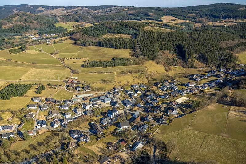 Aerial view, residential area, view of Marmecke with St. Antonius Church, wooded area, hilly landscape with forest damage, Marmecke, Kirchhundem, Sauerland, North Rhine-Westphalia, Germany, place of worship, DE, Europe, place of worship, property tax, holy place, real estate, church, parish, aerial view, aerial photography, aerial photography, religion, overview, bird's eye view, residential complex, living and life, residential area, residential quality, residential neighbourhood, housing estate, residential area, birds-eyes view, overview