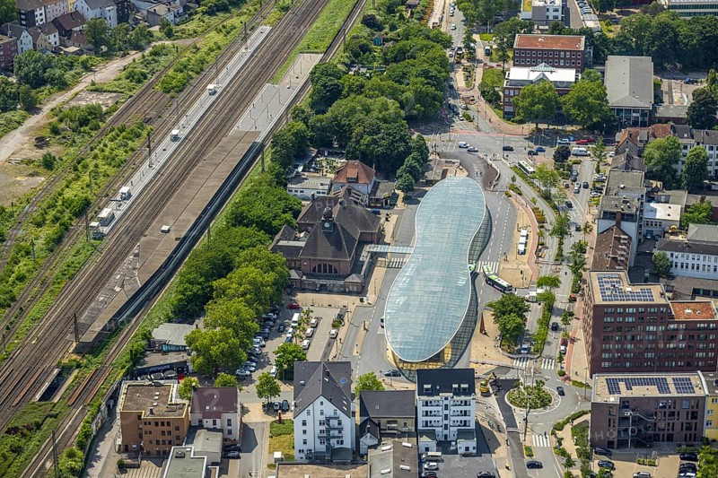 Aerial view, bus station with futuristic roof at Konrad-Adenauer-Platz, Herne main station, Baukau, Herne, Ruhr area, North Rhine-Westphalia, Germany, railway area, railway station, bus, bus station, bus stop, buses, DE, Deutsche Bahn AG, Europe, railway tracks, tracks, main station, central station, roundabout, roundabout, aerial view, aerial photography, aerial photography, bus station, overview, bird's-eye view, ZOB, birds-eyes view, overview, HernerechtsderA43