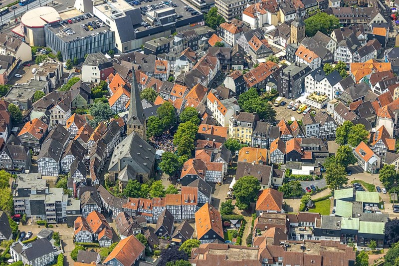Aerial view, historic old town centre with St.-Georg-Kirche and city festival on the church square, red roofs and green trees, emergency service ASB with car and tent during the old town city festival Hattingen, Ruhr area, North Rhine-Westphalia, Germany, old town, place of worship, city, DE, Europe, religious community, place of worship, property tax, Hattingen, holy place, real estate, church, parish, denomination, aerial view, aerial photography, aerial photography, religion, religious site, city centre, overview, bird's-eye view, residential area, living and life, residential area, quality of life, residential quarter, housing estate, residential district, birds-eyes view, overview