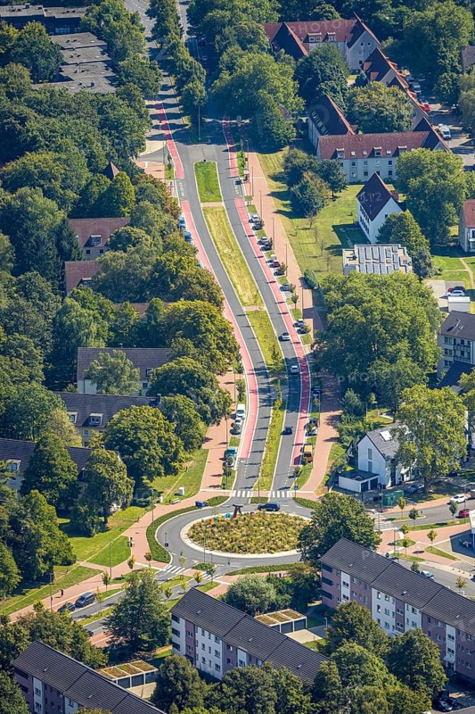 Aerial view, road traffic and planted roundabout Horster Straße and Wiesmannstraße, red marked cycle path, Gladbeck lettering in colourful capital letters with sculpture Alwine, Brauck, Gladbeck, Ruhr area, North Rhine-Westphalia, Germany