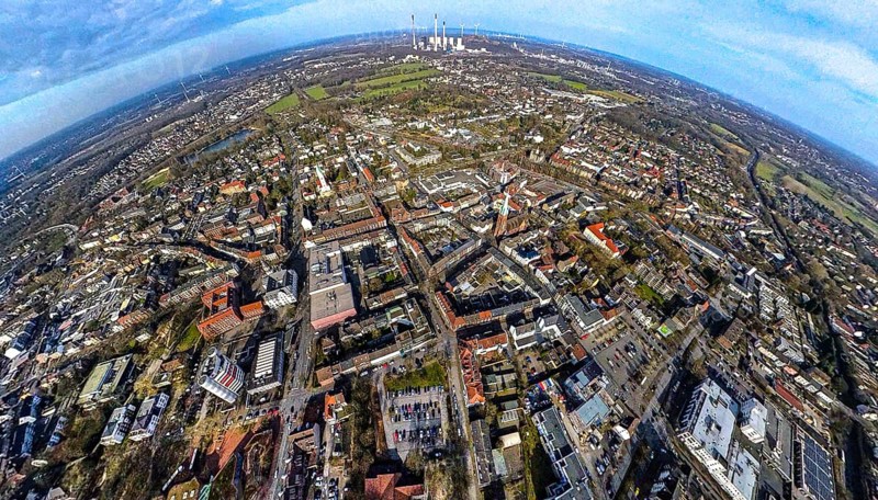 Aerial view, city centre view with ktah. Church St. Lamberti and town hall, behind the Uniper power plant Gelesenkirchen, earth globe, fisheye image, 360 degree image, tiny world, little planet, fisheye image, Gladbeck, Ruhr area, North Rhine-Westphalia, Germany