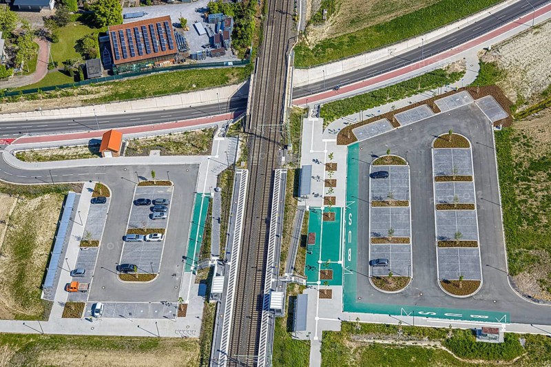 Aerial view, planned local transport connection with stop in Westtünnen, construction site at Südfeldweg and Von-Thünen-Straße for the future railway stop, railway line with railway bridge, car parks, Rhynern district, Hamm, Ruhr area, North Rhine-Westphalia, Germany