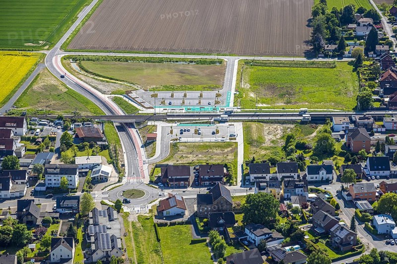 Aerial view, planned local transport connection with stop in Westtünnen, construction site at Südfeldweg and Von-Thünen-Straße for the future railway stop, railway line with railway bridge, car parks, Rhynern district, Hamm, Ruhr area, North Rhine-Westphalia, Germany