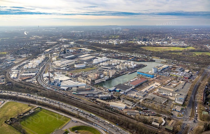 Aerial view, city harbour and Rhine-Herne Canal, goods train connection, behind BP Ruhr oil, below traffic jam on the A42 motorway, Schalke-Nord, Gelsenkirchen, Ruhr area, North Rhine-Westphalia, Germany