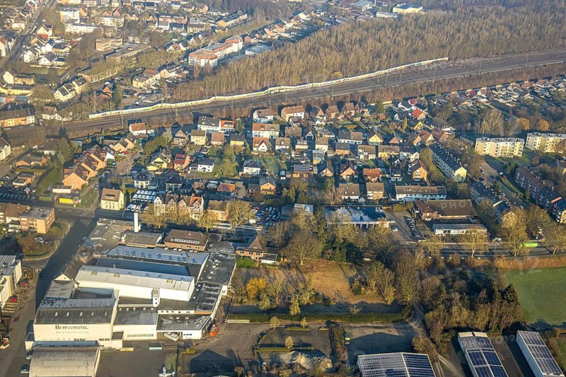 Aerial view, residential area Heessener Straße from Seeburger Straße to An der Mattenbecke with Basic Fit fitness centre and ruins of the car wash, opposite planned building for Bildungszentrum Nord, Heessen district, Hamm, Ruhr area, North Rhine-Westphalia, Germany