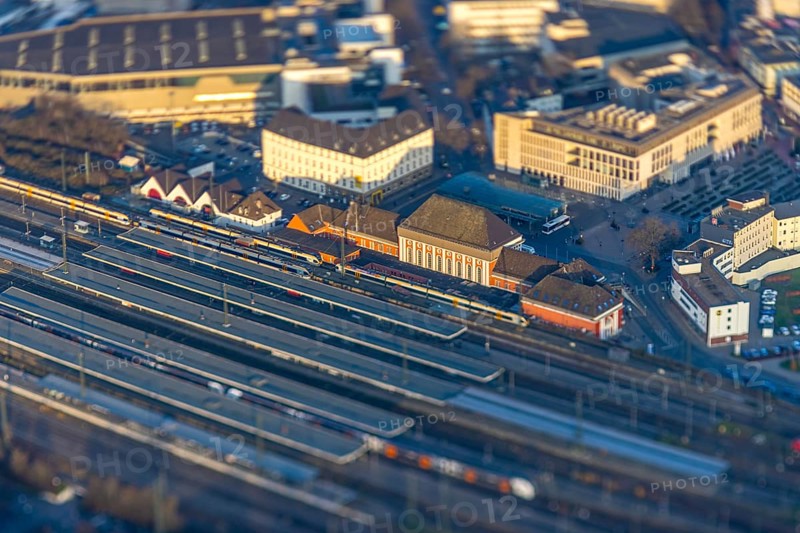 ATTENTION Photos with partial blurring created by tilt technique on the lens side, aerial view, main station Hbf and station forecourt with ZOB bus station, centre, Hamm, Ruhr area, North Rhine-Westphalia, Germany