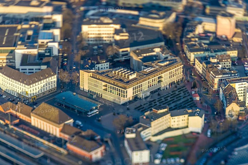 ATTENTION Photos with partial blurring caused by tilt technique on the lens side, aerial view, station forecourt Platz der Deutschen Einheit with VHS, city library and Heinrich-von-Kleist-Forum, centre, Hamm, Ruhr area, North Rhine-Westphalia, Germany