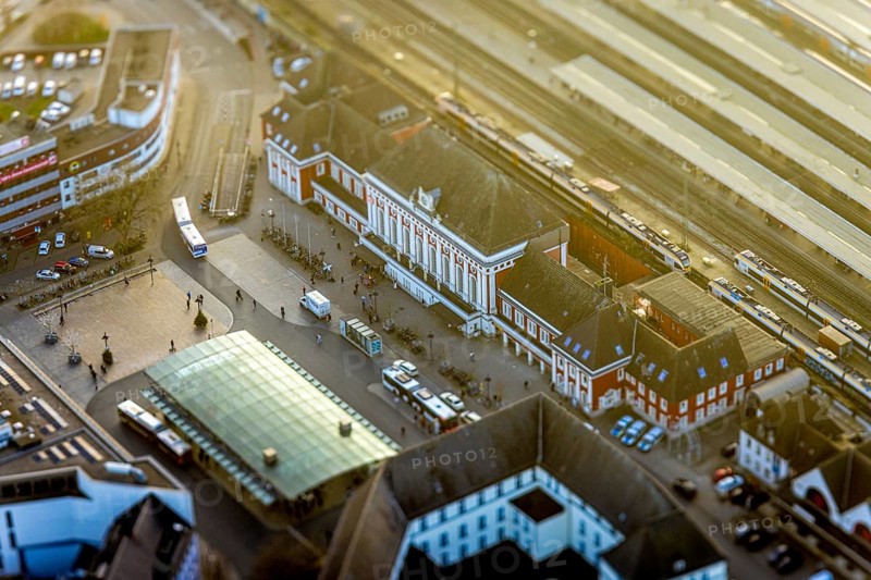 ATTENTION Photos with partial blurring created by tilt technique on the lens side, aerial view, main station Hbf and station forecourt with ZOB bus station, centre, Hamm, Ruhr area, North Rhine-Westphalia, Germany