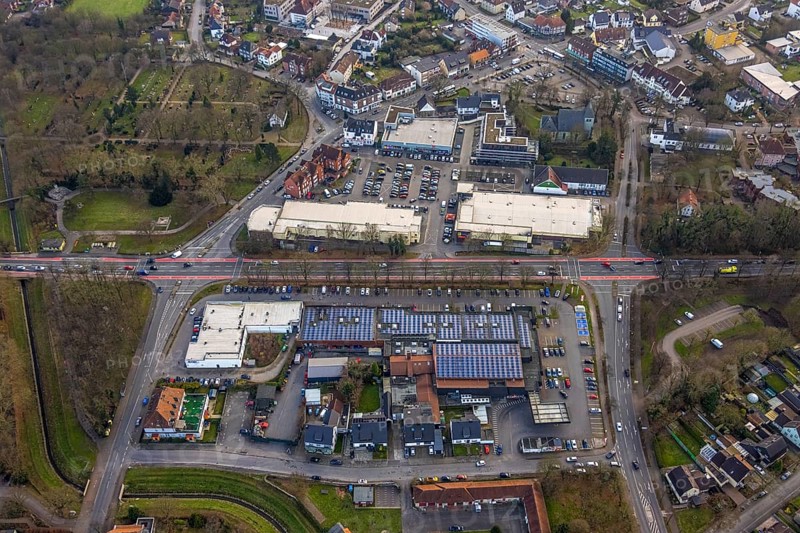 Aerial view, Dortmunder Straße shopping centre with DM, Rewe, Aldi and Edeka supermarket, St. Victor's Church, construction site with new building, Herringen market and town centre, Herringen district, Hamm, Ruhr area, North Rhine-Westphalia, Germany