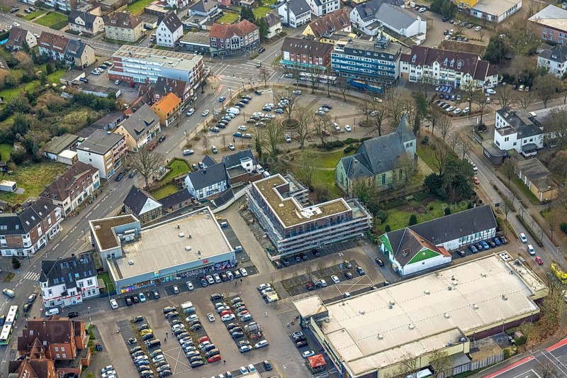 Aerial view, Protestant St. Victor's Church, construction site with new building and car park Herringer Markt, shopping centre Herringen Zentrum, Herringen district, Hamm, Ruhr area, North Rhine-Westphalia, Germany